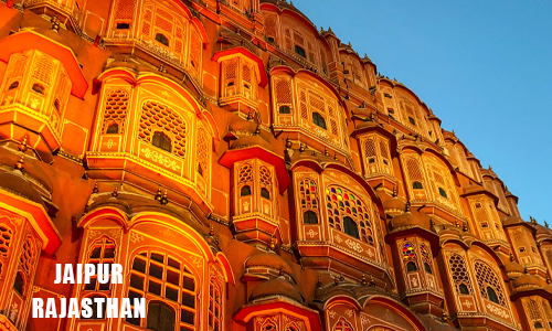 Hawa Mahal Palace in Jaipur, India - a stunning pink sandstone palace with intricate windows and balconies